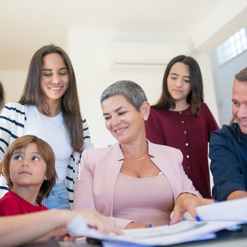 A family discussing important documents around a table